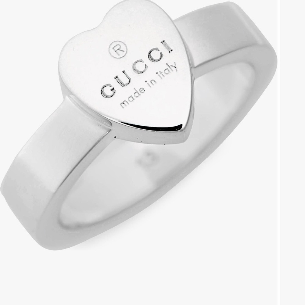 Gucci trademark heart sterling silver ring size 16

AUTHENTIC
